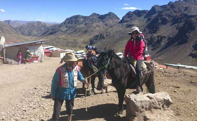 Rainbow Mountain horseback ride Vinicunca Cusco Peru Andes landscape 2026