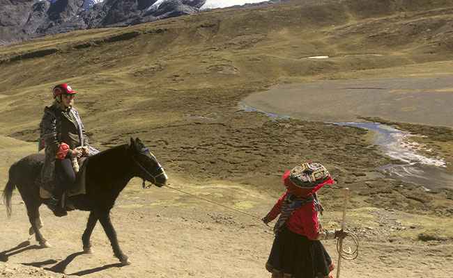 Horseback ride to Rainbow Mountain Vinicunca in Peru