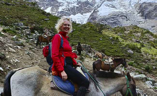 Horseback ride to Humantay Lake Cusco Andes mountains Peru