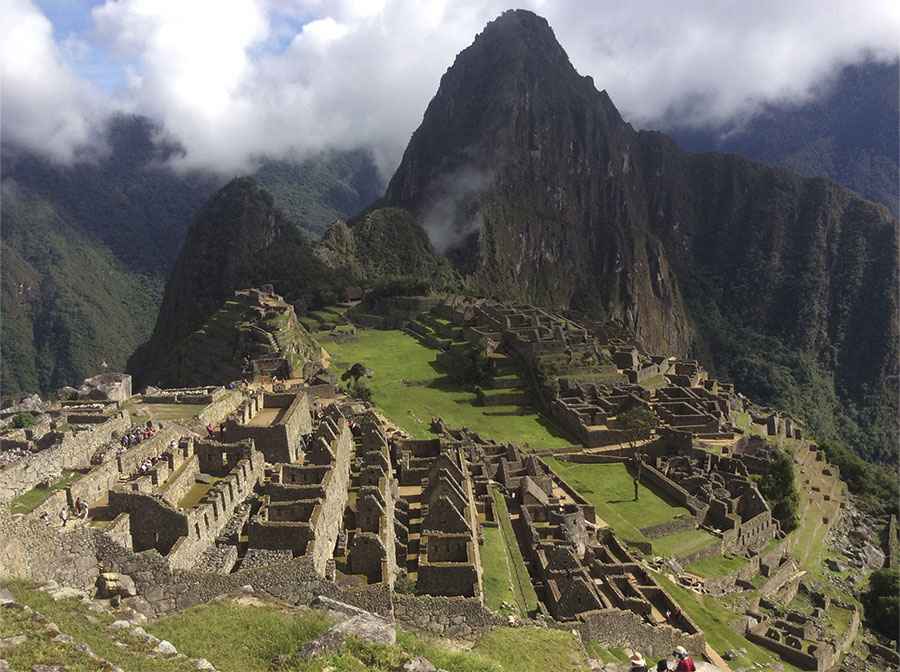 Scenic views of Machu Picchu, Cusco city, Sacred Valley, and Rainbow Mountain during the 4-Day Machu Picchu Tour 2026. Explore Inca ruins, fertile valleys, and local landscapes with a guided private tour in Peru